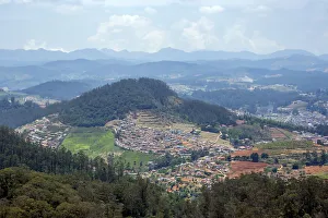 <b class=qtipBold><figcaption>Ooty and hills a closer view</figcaption></b><br>Ooty and surroundings an aerial view. Taken from the highest peak in Nilgiris, Doddabetta.<br><em>© Dethan Punalur</em> Ooty and hills a closer view