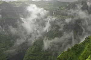 <b class=qtipBold><figcaption>Raw</figcaption></b><br>the raw nature of sahyadri mountain range during Monsoon season Raw