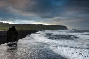 Reynisdrangar rock formation, dramatic clouds, black sand beach, near Vik i Myrdal Reynisdrangar rock formation, dramatic clouds, black sand beach, near Vik i Myrdal