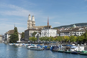 View from Quaibruecke bridge over the Limmat river to the marina with the Limmat quay View from Quaibruecke bridge over the Limmat river to the marina with the Limmat quay