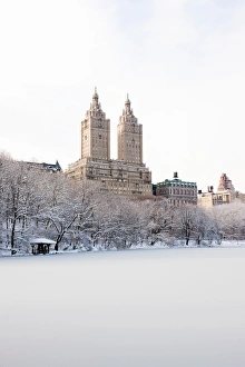 View of The San Remo building from Central Park lake in winter, Manhattan, New York City View of The San Remo building from Central Park lake in winter, Manhattan, New York City
