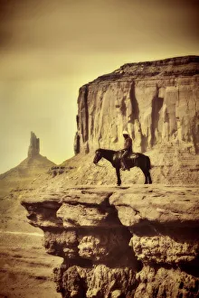 Wildwest Coyboy on Horse in Old Retro Antique Sepia Tone Wildwest Coyboy on Horse in Old Retro Antique Sepia Tone