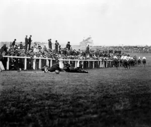 Votes for women, Suffragette Protest at 1913 Epsom Derby. As the horses swept round Votes for women, Suffragette Protest at 1913 Epsom Derby. As the horses swept round