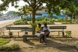 A couple speaks in a park in the centre of Bangui, Central African Republic A couple speaks in a park in the centre of Bangui, Central African Republic