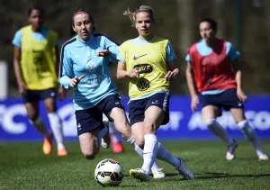 France's forward Eugenie Le Sommer (C) vies fpr the ball with France's defender France's forward Eugenie Le Sommer (C) vies fpr the ball with France's defender