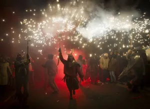 A reveller wearing a demon costume takes part in the traditional festival of " A reveller wearing a demon costume takes part in the traditional festival of "