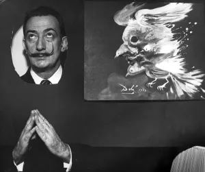 Salvador Dali Poses next to his masterpiece Salvador Dali Poses next to his masterpiece