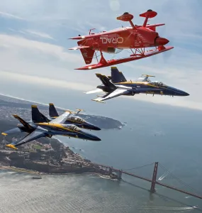 Team Oracle stunt pilot Sean Tucker (above) flies near the Golden Gate Bridge along with Team Oracle stunt pilot Sean Tucker (above) flies near the Golden Gate Bridge along with