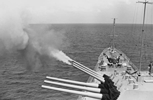 USS Boston's triple gun turret fires on North Vietnamese targets, Operation Sea Dragon USS Boston's triple gun turret fires on North Vietnamese targets, Operation Sea Dragon