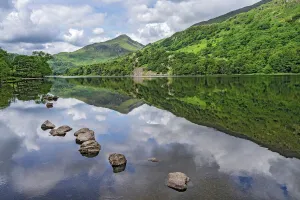 Reflections in Llyn Gwynant in the Glaslyn valley, looking west with Yr Aran mountain Reflections in Llyn Gwynant in the Glaslyn valley, looking west with Yr Aran mountain