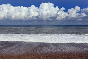 RF- Waves of the North Sea washing onto Weybourne beach, Norfolk, UK. August 2014 RF- Waves of the North Sea washing onto Weybourne beach, Norfolk, UK. August 2014