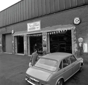 Mk 1 BMC Austin 1800 outside a tyre fitting bay in Rotherham, South Yorkshire, 1969 Mk 1 BMC Austin 1800 outside a tyre fitting bay in Rotherham, South Yorkshire, 1969