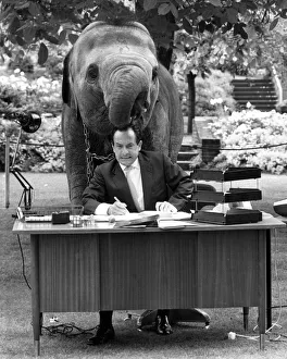 Spanish mime artist Alberto Vidal appearing at London Zoo with an elephant Spanish mime artist Alberto Vidal appearing at London Zoo with an elephant