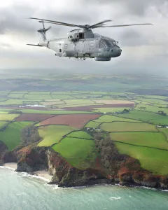 A Merlin HM Mk1 helicopter from 829 Naval Air Squadron, based at RNAS Culdrose, flying A Merlin HM Mk1 helicopter from 829 Naval Air Squadron, based at RNAS Culdrose, flying